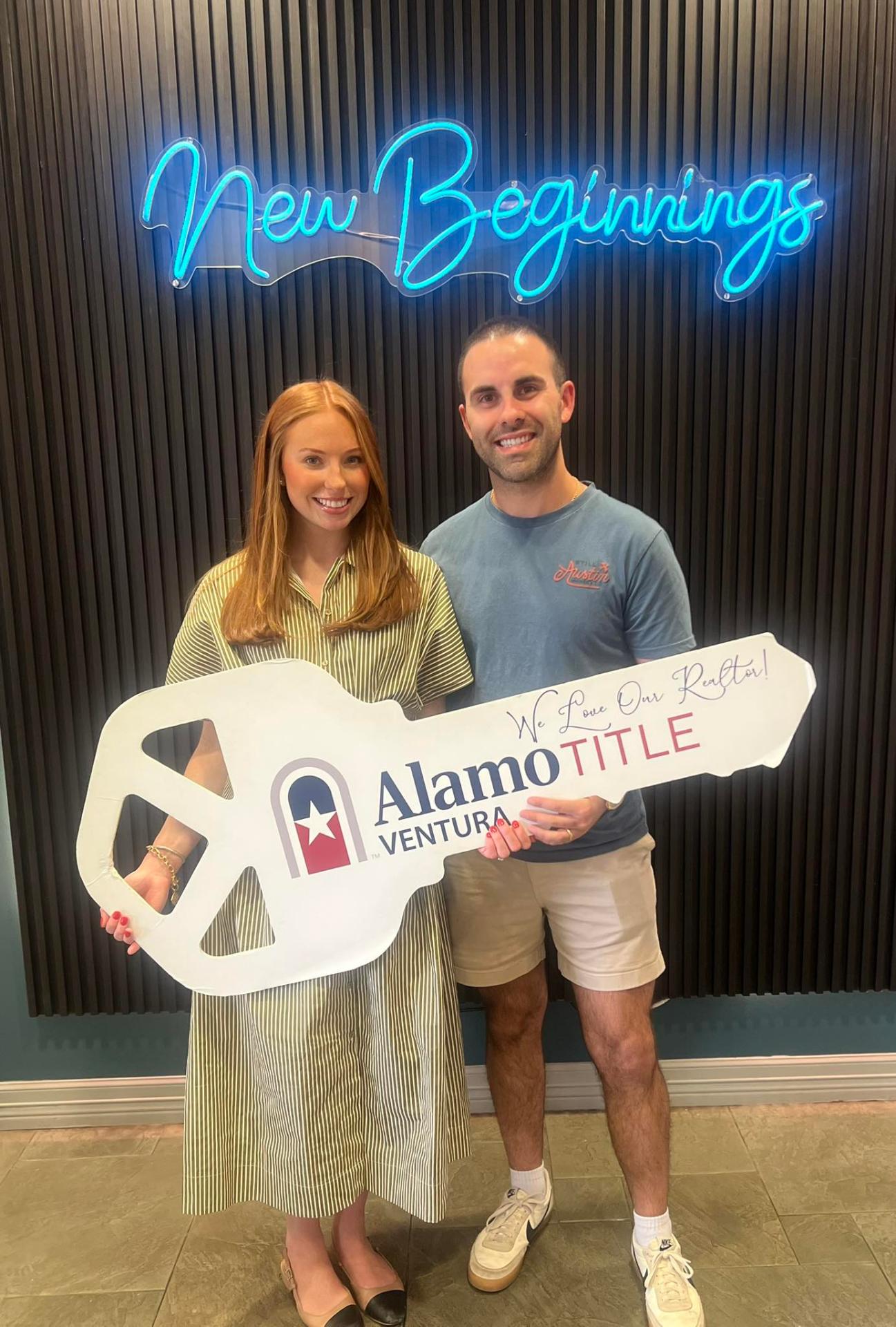 Happy clients celebrating their new home at closing